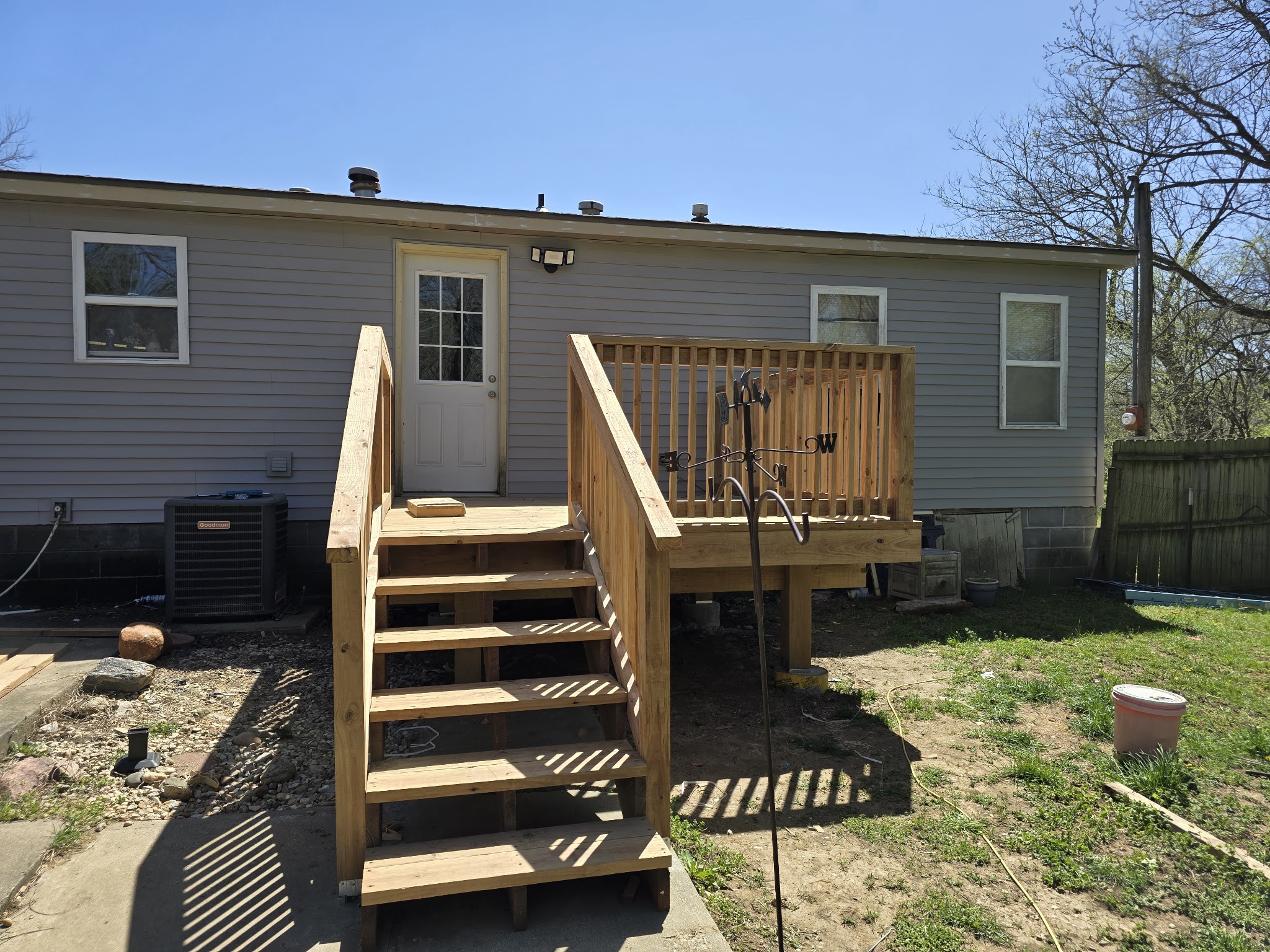 New wooden back stairs and landing with railings